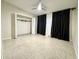 Bedroom with an open closet, bright light, and neutral colored walls at 319 Halsey St, Orlando, FL 32839