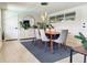 Elegant dining room with seating for six and modern lighting at 319 Halsey St, Orlando, FL 32839