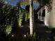 Well manicured landscaping, landscape lighting, and exterior wall lighting at 319 Halsey St, Orlando, FL 32839