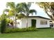 Charming single-story home with mature trees, well-manicured lawn and lush landscaping at 319 Halsey St, Orlando, FL 32839