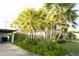 Charming single-story home with well-manicured lawn, lush landscaping and palm trees at 319 Halsey St, Orlando, FL 32839
