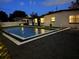 Pool with landscaping at night at 319 Halsey St, Orlando, FL 32839