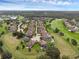 Aerial view of home exteriors and landscaping at 32004 Redtail Reserve Blvd, Sorrento, FL 32776