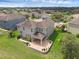 A paver patio adds to the curb appeal of this home's backyard at 32004 Redtail Reserve Blvd, Sorrento, FL 32776