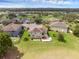 Lush backyard with covered patio, set in a quiet, well maintained neighborhood at 32004 Redtail Reserve Blvd, Sorrento, FL 32776
