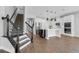 Modern kitchen with large center island, stainless steel appliances, and stylish pendant lighting at 32004 Redtail Reserve Blvd, Sorrento, FL 32776