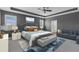 Spacious main bedroom featuring a tray ceiling, sitting area, and an ensuite bathroom at 32004 Redtail Reserve Blvd, Sorrento, FL 32776