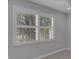 Window with white frame and shutters offering bright natural light at 32004 Redtail Reserve Blvd, Sorrento, FL 32776