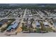Neighborhood aerial view near the beach showing proximity to water and other houses in the community at 3309 Hill St, New Smyrna Beach, FL 32169