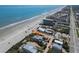 Aerial view of a stunning beach house close to the ocean. Perfect for relaxing vacations at 3309 Hill St, New Smyrna Beach, FL 32169