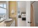 Elegant bathroom view showcasing access to the main bedroom with a shower to the right at 3309 Hill St, New Smyrna Beach, FL 32169
