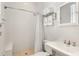 Clean bathroom with a stand-up shower, towel rack, and bright white finishes at 3309 Hill St, New Smyrna Beach, FL 32169