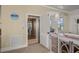 Welcoming entryway featuring an elevator and stylish decor, flowing into the living spaces at 3309 Hill St, New Smyrna Beach, FL 32169