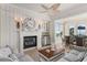 Living area with fireplace, built-in bar, and ocean view at 3309 Hill St, New Smyrna Beach, FL 32169