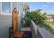 Convenient outdoor shower with unique design, surrounded by lush landscaping at 3309 Hill St, New Smyrna Beach, FL 32169