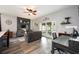 Comfortable living room with stylish furnishings, french doors and modern decor at 415 Eastbridge Dr, Oviedo, FL 32765