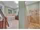 Primary bathroom featuring a luxurious soaking tub, walk-in shower, and neutral color palette at 419 Whitcomb Dr, Geneva, FL 32732