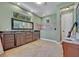 Bathroom with a large double sink vanity, neutral-toned walls, and large shower at 419 Whitcomb Dr, Geneva, FL 32732