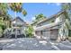 Stunning two-story home featuring a three-car garage and inviting front entry with well-manicured landscaping at 419 Whitcomb Dr, Geneva, FL 32732