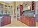 Gourmet kitchen showcasing stainless steel appliances, custom cabinetry, and a stylish backsplash at 419 Whitcomb Dr, Geneva, FL 32732