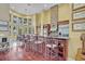 Spacious kitchen featuring a breakfast bar, granite countertops, stainless steel appliances and high ceilings at 419 Whitcomb Dr, Geneva, FL 32732