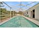 This pool is very inviting with screened enclosure, patio furniture, and a relaxing atmosphere at 443 Magpie Ct, Poinciana, FL 34759