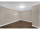 This light filled bedroom has wood floors and neutral paint at 461 Brentwood Dr, Daytona Beach, FL 32117