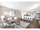 Open living space with modern décor, including plush seating and a kitchen bar at 461 Brentwood Dr, Daytona Beach, FL 32117