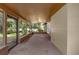 Spacious covered patio featuring a screen and a serene view of the backyard at 525 Garden Heights Dr, Winter Garden, FL 34787