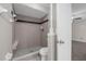 Neutral shower with tile backsplash and mosaic tile flooring at 525 Garden Heights Dr, Winter Garden, FL 34787