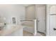 Bathroom featuring a soaking tub with decorative tile surround and a separate shower at 5368 Oakbourne Ave, Davenport, FL 33837