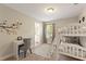 Charming ' bedroom with bunk beds, a desk, and a view from the window at 5368 Oakbourne Ave, Davenport, FL 33837