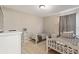 Charming bedroom with two twin beds, soft carpeting, and neutral decor at 5368 Oakbourne Ave, Davenport, FL 33837