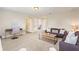 Bonus room featuring carpeted floors, neutral colors, and comfortable lounge furniture at 5368 Oakbourne Ave, Davenport, FL 33837