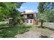 This house has multi-level decks and patios, along with stone features at 546 Winona Dr, Geneva, FL 32732