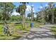 Fenced horse property with mature trees and gate, ideal for equestrian enthusiasts seeking a serene rural environment at 546 Winona Dr, Geneva, FL 32732