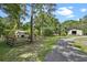 Property featuring several outbuildings, including fenced areas and storage sheds, perfect for rural living and hobby farming at 546 Winona Dr, Geneva, FL 32732