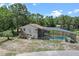 Aerial view showing an ample yard, pool and back of house at 546 Winona Dr, Geneva, FL 32732