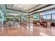Spacious meeting room or community room with a hardwood floor and comfortable seating arrangement at 5917 Coquyt Dr, Mount Dora, FL 32757