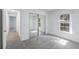 Bedroom with mirrored closet doors and a window providing natural light at 5990 Se 5Th Pl, Ocala, FL 34472
