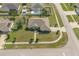 Aerial view of home featuring mature landscaping, well-manicured lawns, and inviting curb appeal at 710 Independence Dr, Orange City, FL 32763