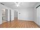 Bright bedroom with laminate floors with easy access to an en suite bathroom at 710 Independence Dr, Orange City, FL 32763
