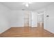 Laminate floors and neutral walls provide a blank slate for a future bedroom at 710 Independence Dr, Orange City, FL 32763