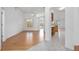 Spacious open-concept living area featuring hardwood floors and natural light at 710 Independence Dr, Orange City, FL 32763