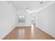 Cozy living area with beautiful flooring, ceiling fan, and natural light at 710 Independence Dr, Orange City, FL 32763
