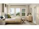 Bright bedroom with large windows, neutral tones, and stylish decor creating a serene and inviting atmosphere at 7374 Ivy Tendril Ave, Orlando, FL 32829