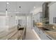 Gourmet kitchen with a large island, stainless steel appliances, and custom cabinetry at 10 Dial Ave, Debary, FL 32713