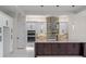 Gourmet kitchen with a large island, stainless steel appliances, and custom cabinetry at 10 Dial Ave, Debary, FL 32713