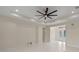 Bright living room featuring recessed lighting, a modern ceiling fan, and french doors at 10 Dial Ave, Debary, FL 32713