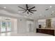 Bright living room featuring recessed lighting, a modern ceiling fan, and french doors at 10 Dial Ave, Debary, FL 32713